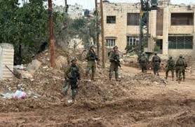 قوات العدو الصهيوني تداهم مدرسة خلال اقتحامها حوسان غرب بيت لحم