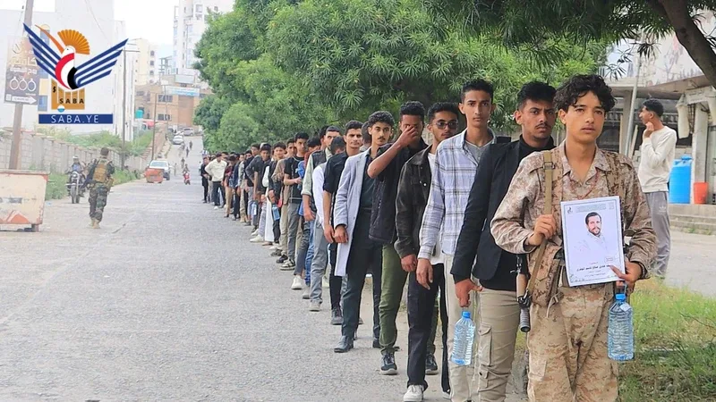 مسير ووقفة لخريجي دورات التعبئة بجامعتي إب والماليزية