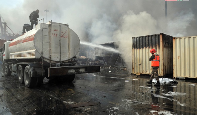 الاطفاء السورية تسيطر على الحرائق في ميناء اللاذقية جراء العدوان الصهيوني