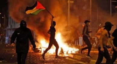 عن القصيدة الفلسطينية في مواجهة التطبيع: الثقافة كساحة اشتباك وجبهة مقاومة عن القصيدة الفلسطينية في مواجهة التطبيع: الثقافة كساحة اشتباك وجبهة مقاومة