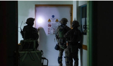 السي ان ان لا تستبعد قيام جيش العدو بنقل أسلحة إلى مستشفى الشفاء ثم عرضها على الصحفيين